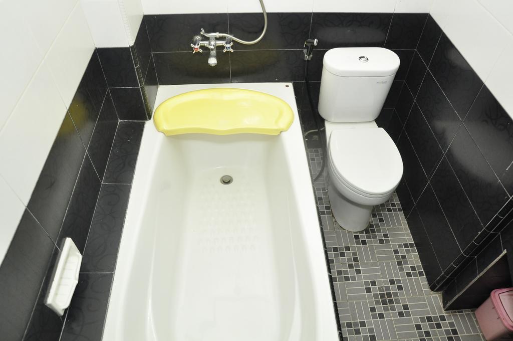 Hotel Andhika Syariah Samarinda Habitación foto