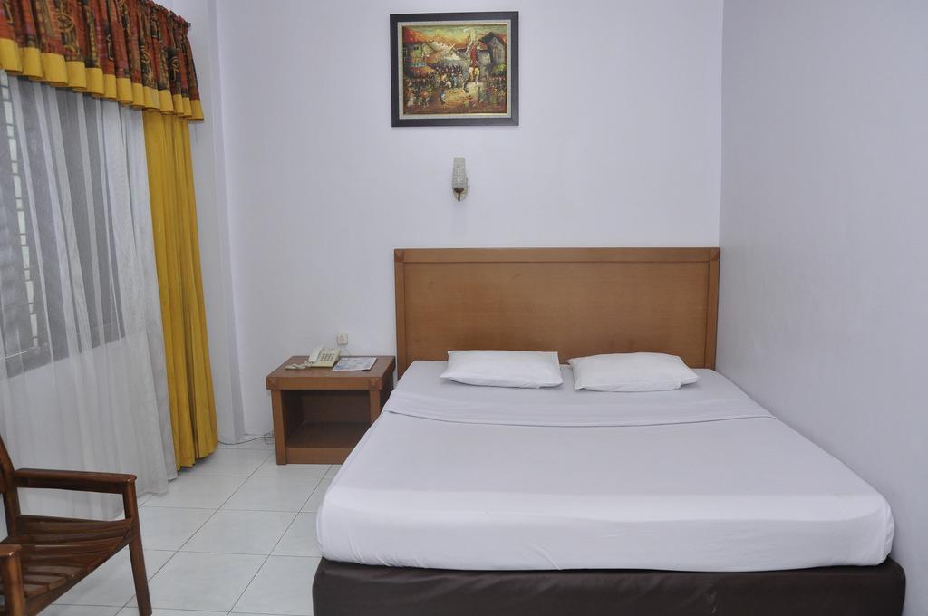 Hotel Andhika Syariah Samarinda Habitación foto