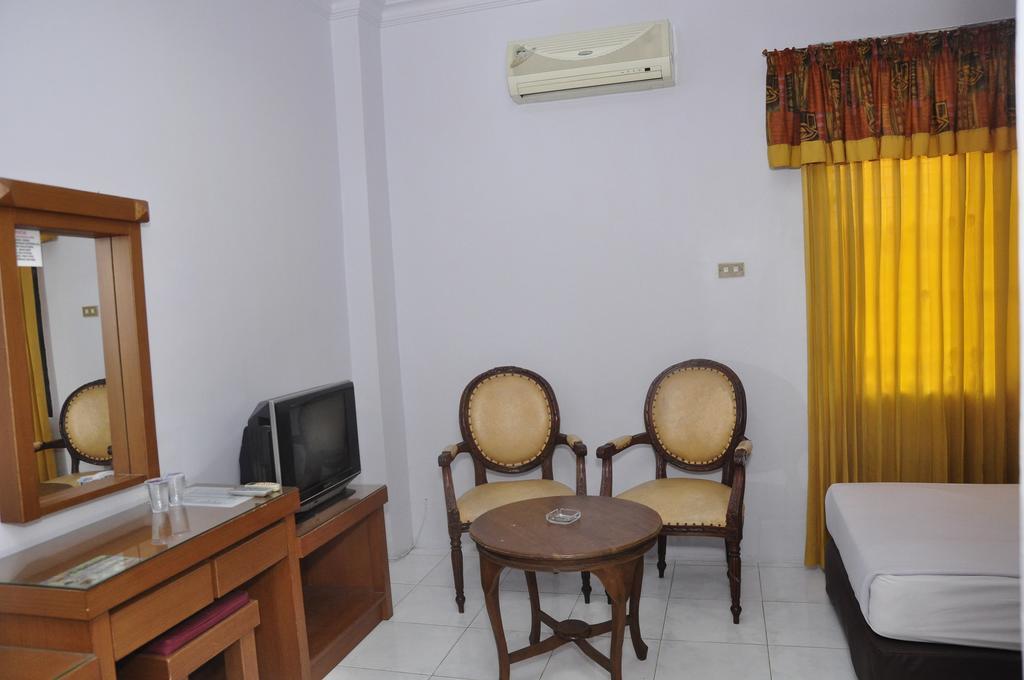 Hotel Andhika Syariah Samarinda Habitación foto