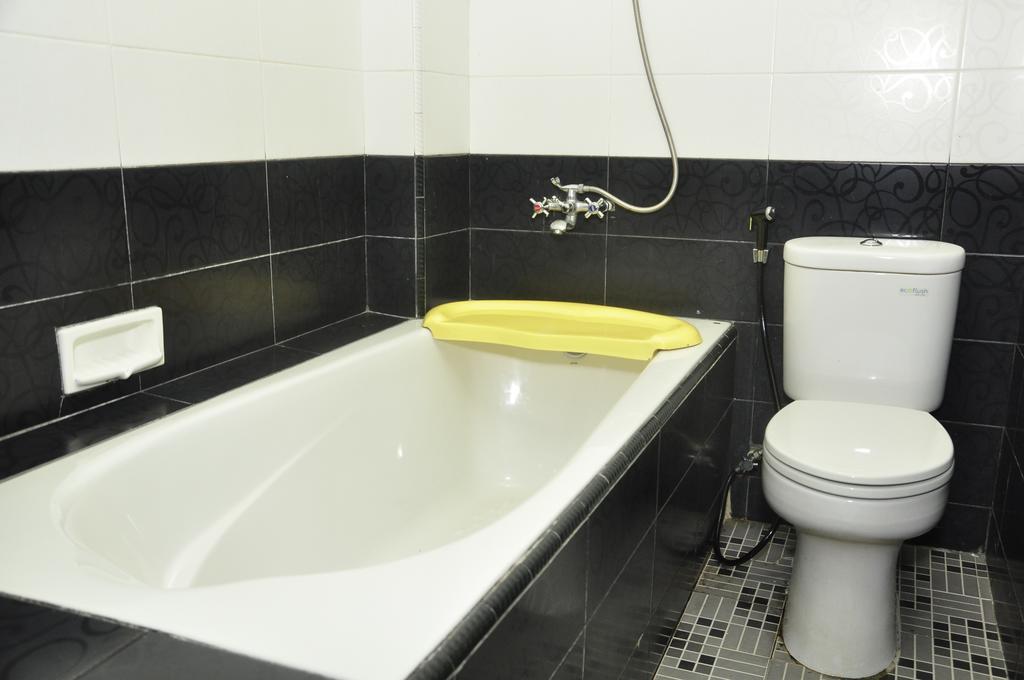 Hotel Andhika Syariah Samarinda Habitación foto