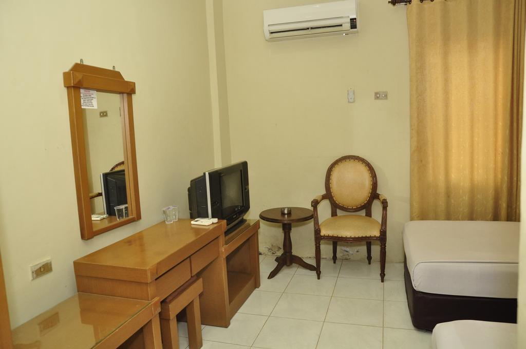 Hotel Andhika Syariah Samarinda Habitación foto