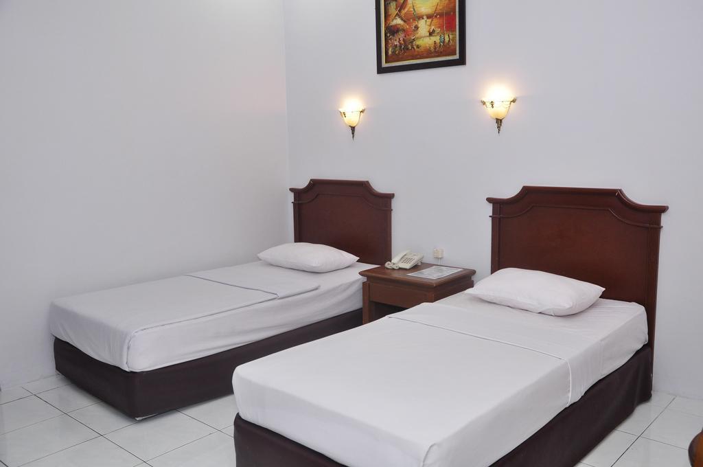 Hotel Andhika Syariah Samarinda Habitación foto