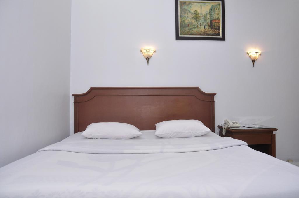 Hotel Andhika Syariah Samarinda Habitación foto
