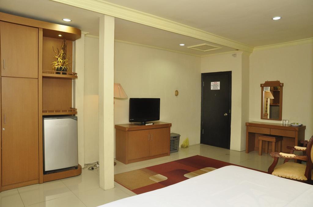Hotel Andhika Syariah Samarinda Habitación foto